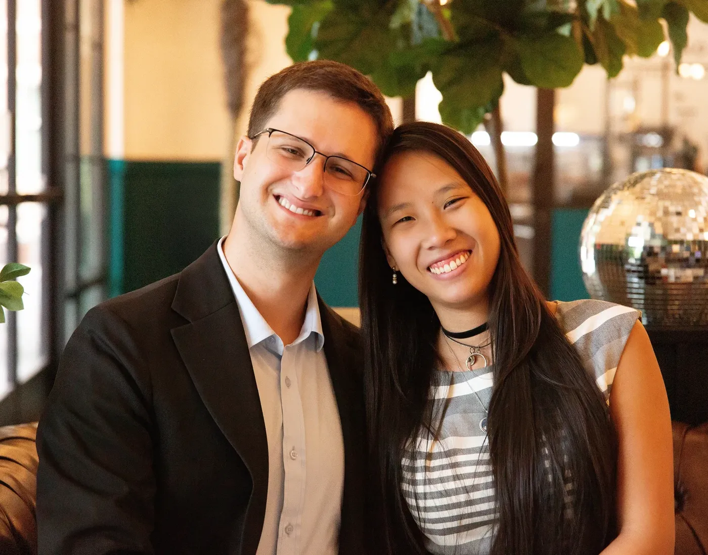 Sam and his wife smiling together