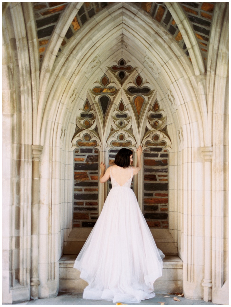 Romantic bridal photo at Duke University Chapel with historic architecture in background