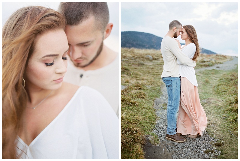 Engaged couple hiking together at Roan Mountain TN during their engagement session