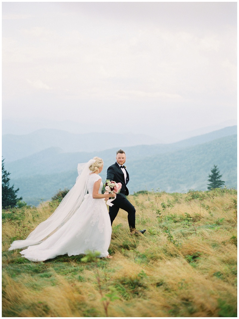 Bride and groom posing during Roan Mountain TN elopement after session