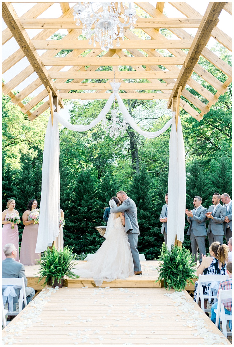 Carissa and Travis exchanging vows in Knoxville