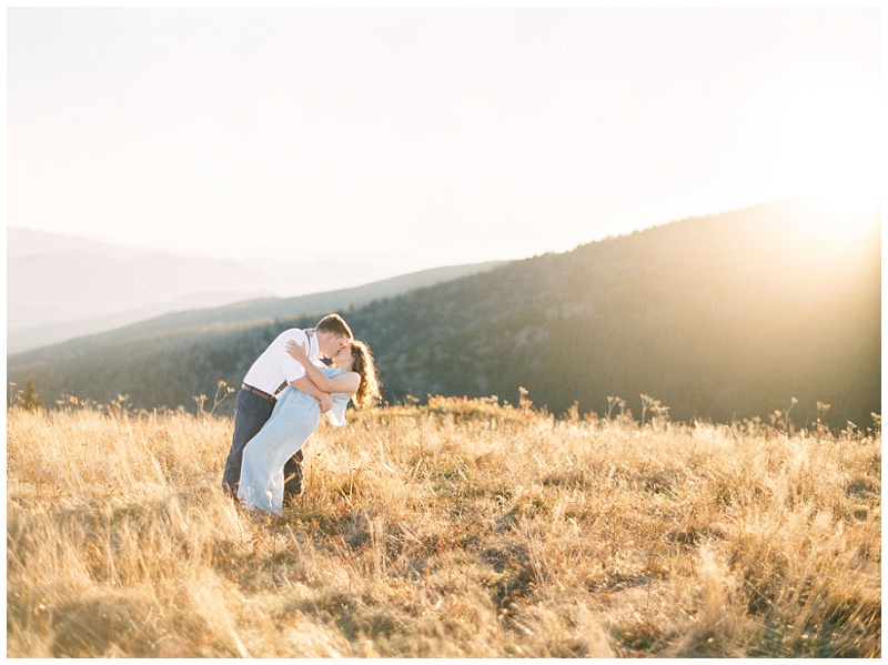 Braxton kissing Rebekah’s forehead during engagement session