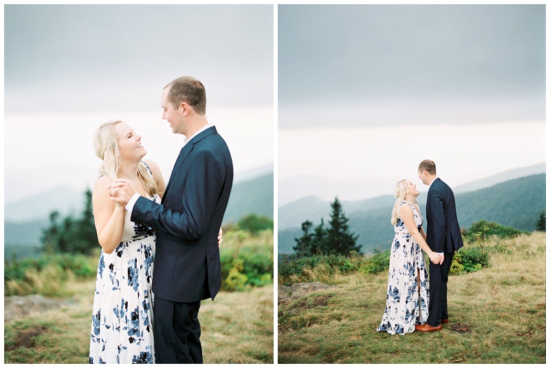 Candid outdoor engagement photos of couple hiking in mountains