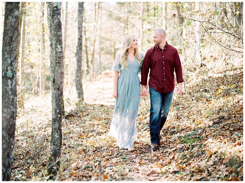 Natural Tunnel State Park engagement pictures couple walking in scenic mountains