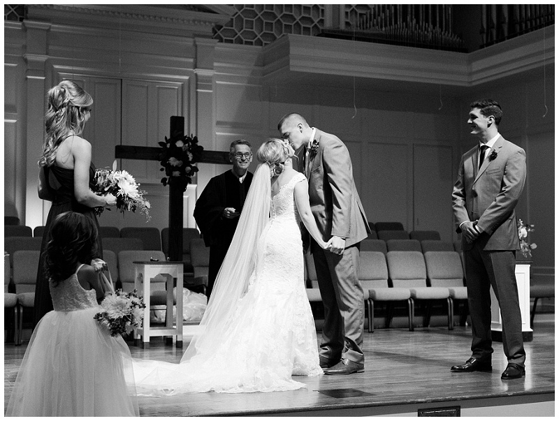 Downtown Kingsport TN bride and groom kissing after ceremony Downtown Kingsport TN bride and groom kissing after ceremony