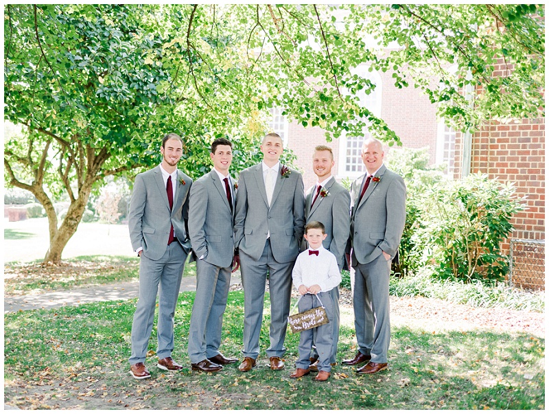 Groom standing with groomsmen at a downtown kingsport tn wedding Groom standing with groomsmen at a downtown kingsport tn wedding