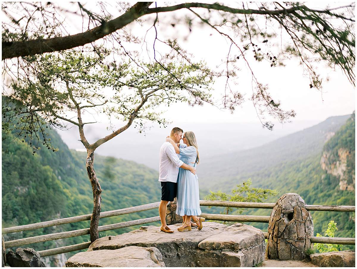 Engagement portraits with lush greenery in Cloudland Canyon
