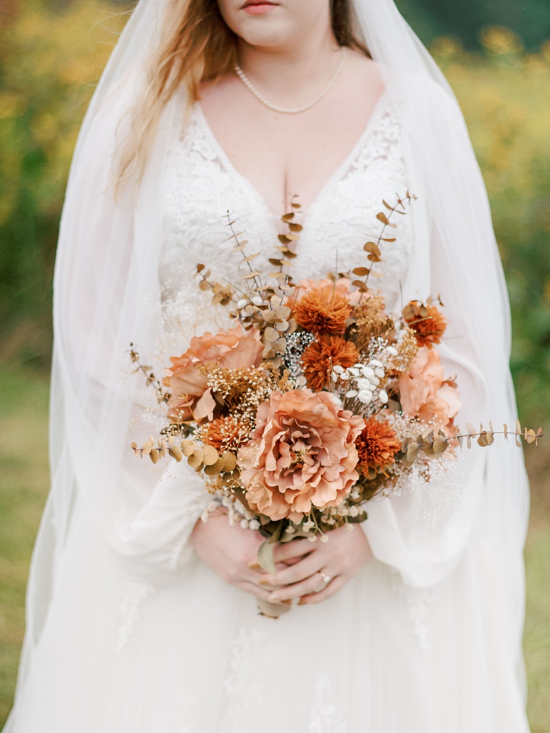 Bride holding bouquet at state park wedding