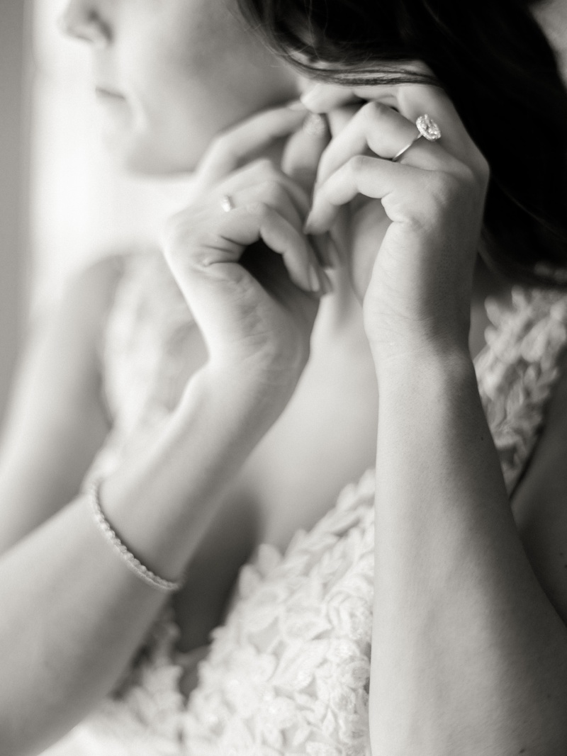 Bride stepping into dress at Marblegate Farm