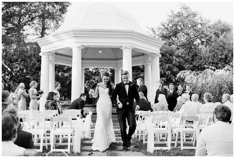 bride and groom exiting their wedding ceremony