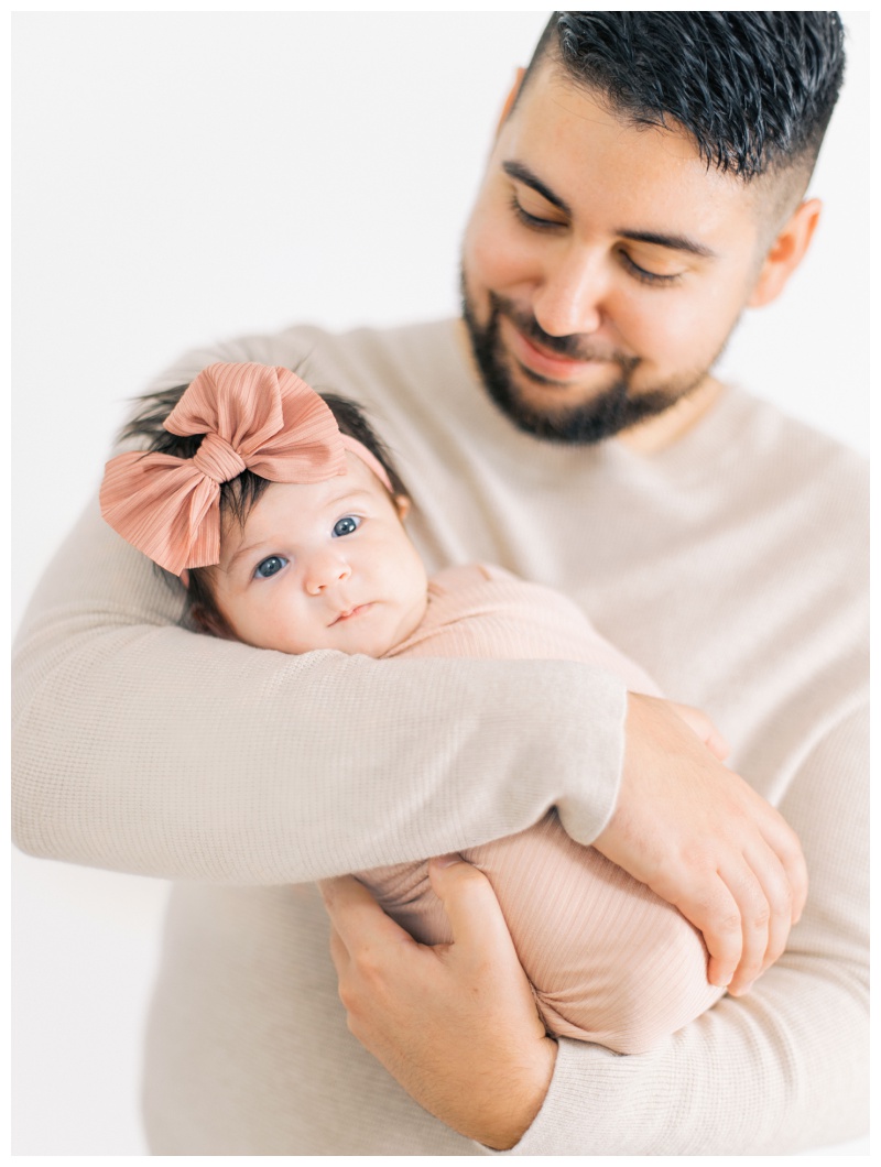 Baby Evie looking serene in controlled studio lighting