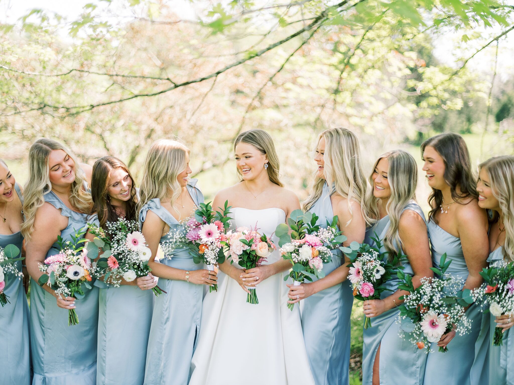 bridesmaids holding bouquets at Lake House wedding venue Tennessee