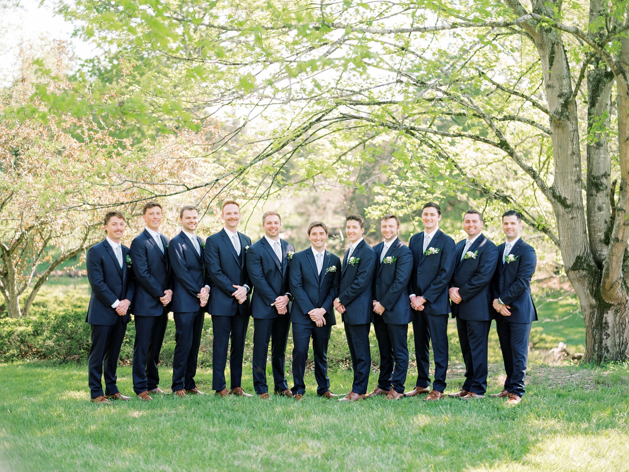 groomsmen group photo at Lake House wedding venue Boone Lake