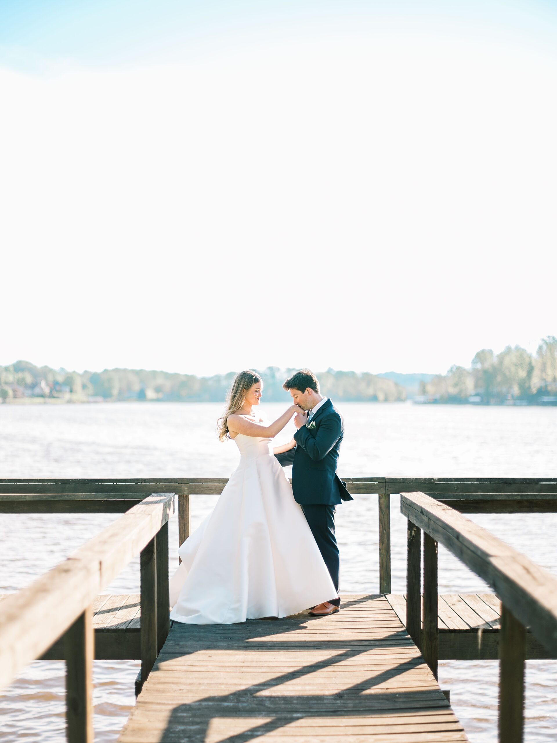 bride and groom embracing at Lake House wedding venue Tennessee