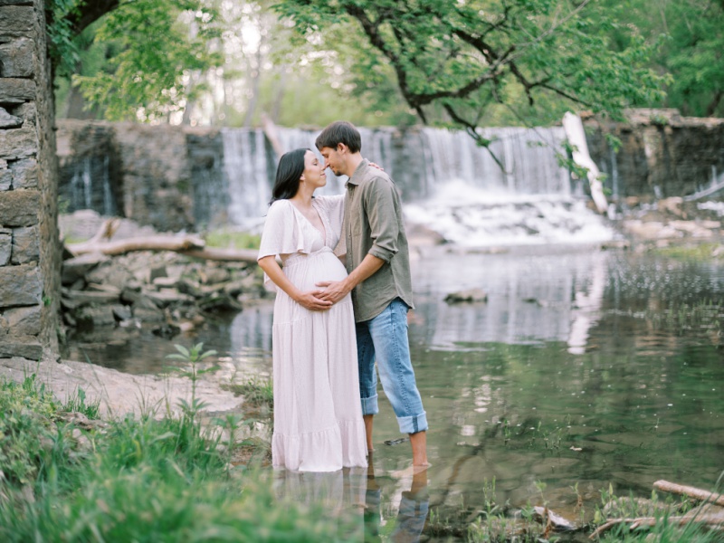 Kingsport maternity photographer natural light session in front of waterfall