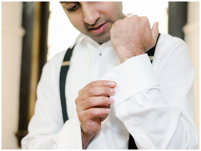 groom close up of cuff links