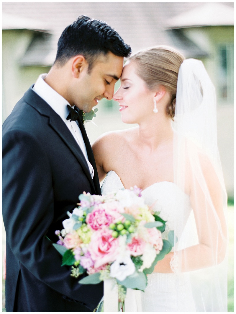 bride and groom romantic portrait church