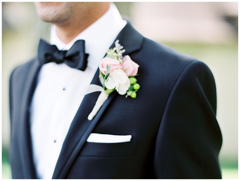 groom looking away candid portrait