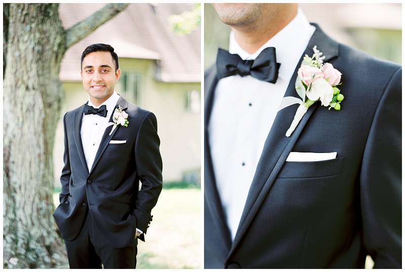 groom adjusting jacket classic style