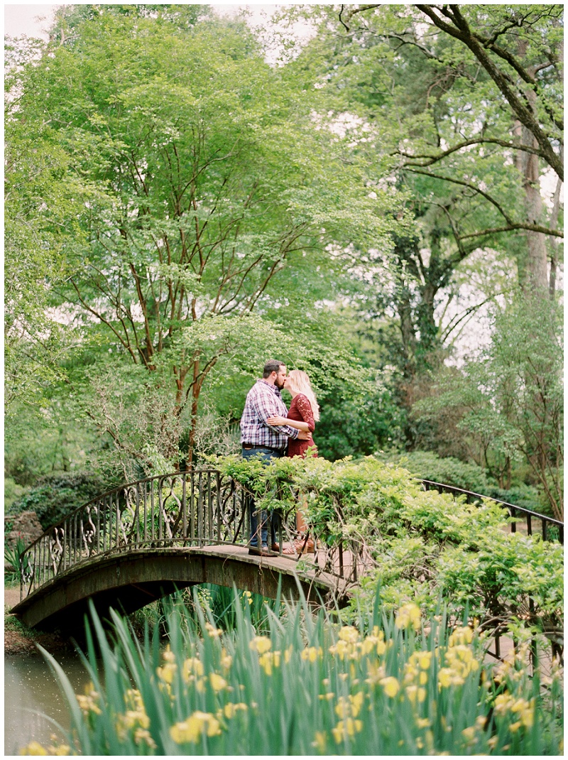 romantic engagement photos Jackson MS bridge