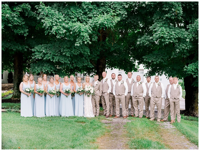 bridal party cheering bride and groom