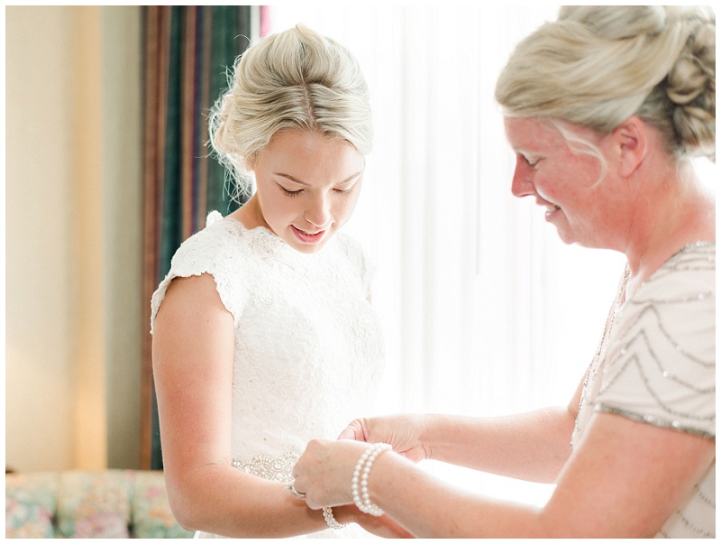 bride putting on dress Johnson City TN
