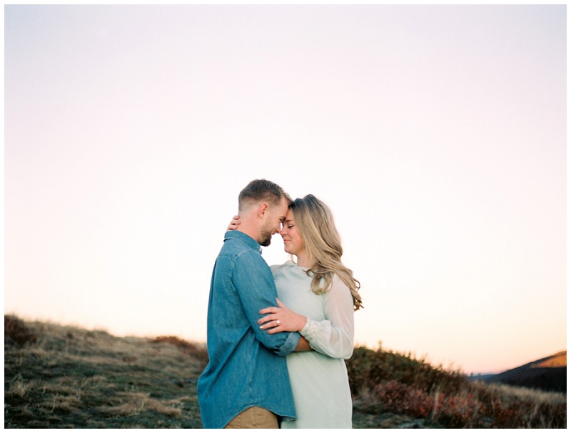 couple walking roan mountain balds engagement session tn couple walking roan mountain balds engagement session tn
