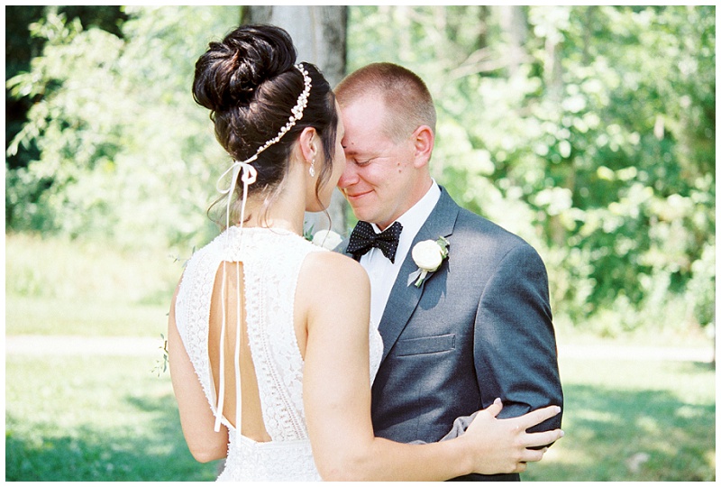 bride and groom smiling together at Ramble Creek Athens TN