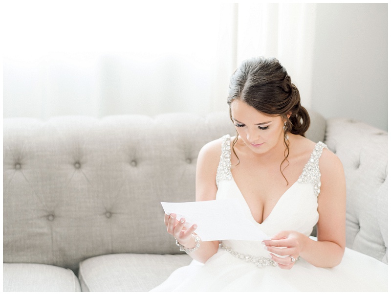 bride reading letter in bridal suite at ramble creek events venue