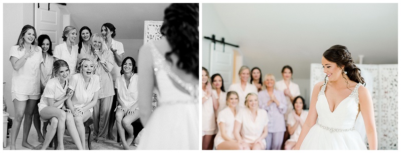 bride smiling showing bridesmaids her dress at athens tn wedding