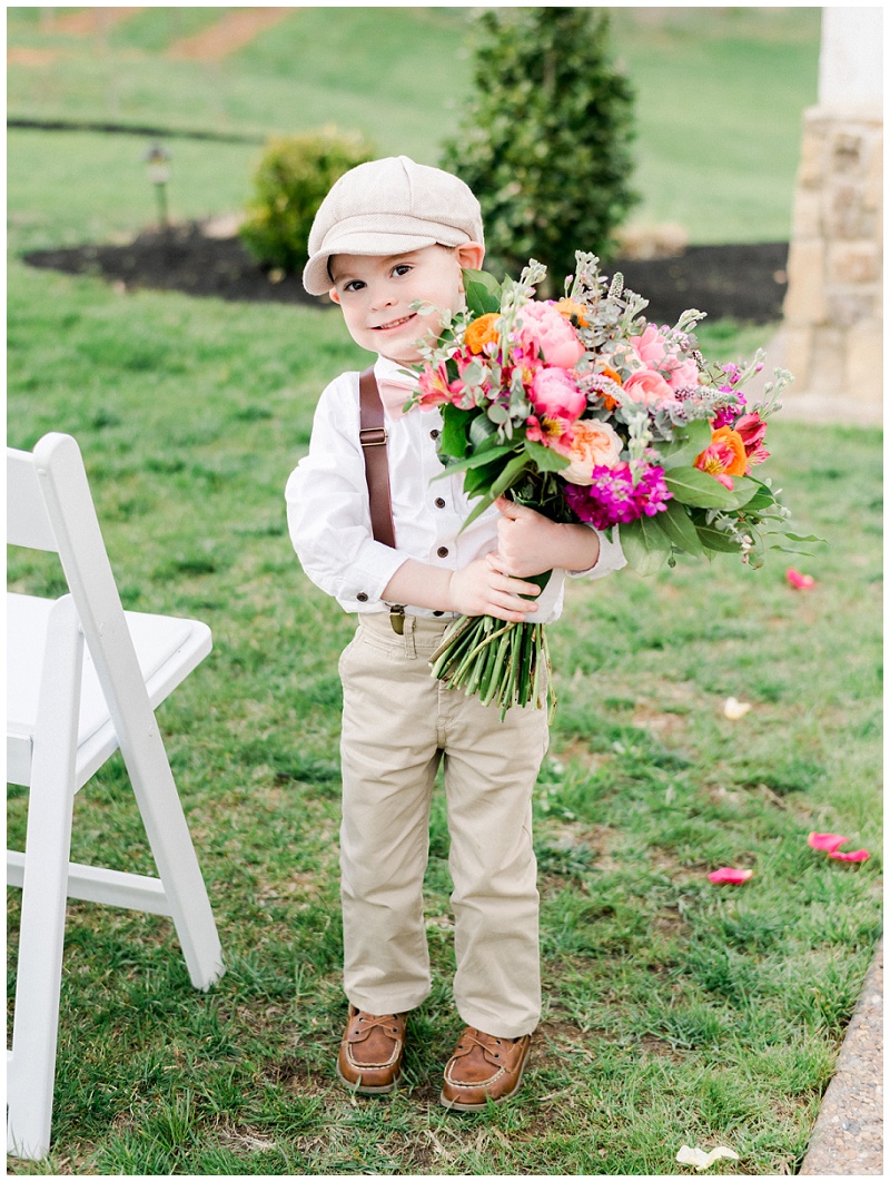  little groomsmen smiling at camera