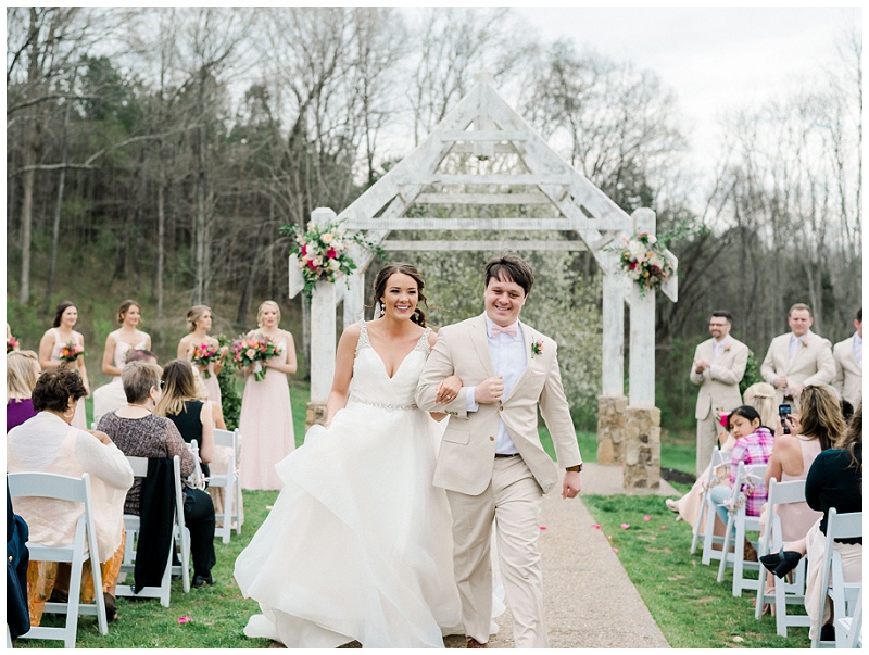 bride and groom altar moment