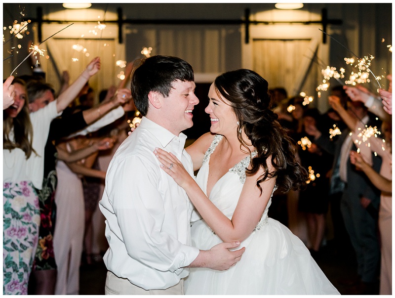 reception sparkler exit bride and groom at ramble creek event venue