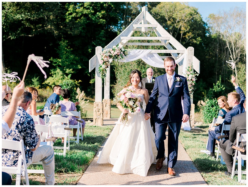 bride and groom altar moment