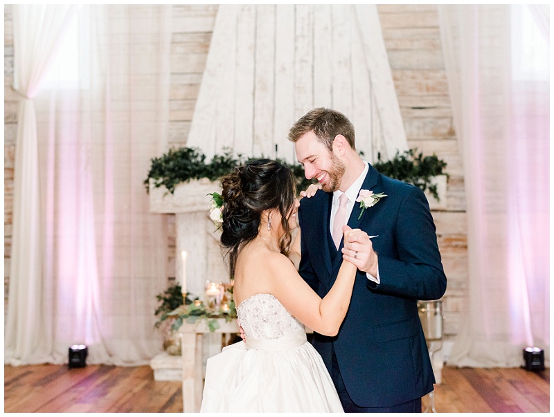 reception first dance couple smiling together