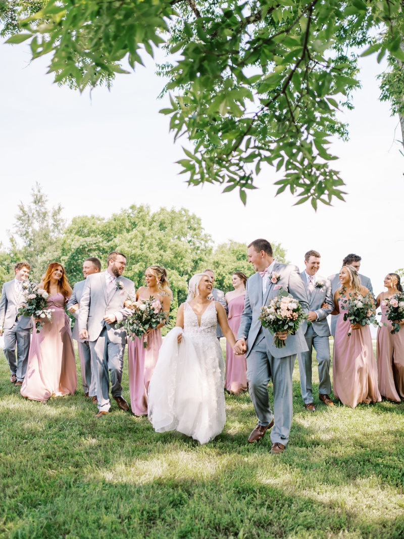 Bridal party group portrait in farmland