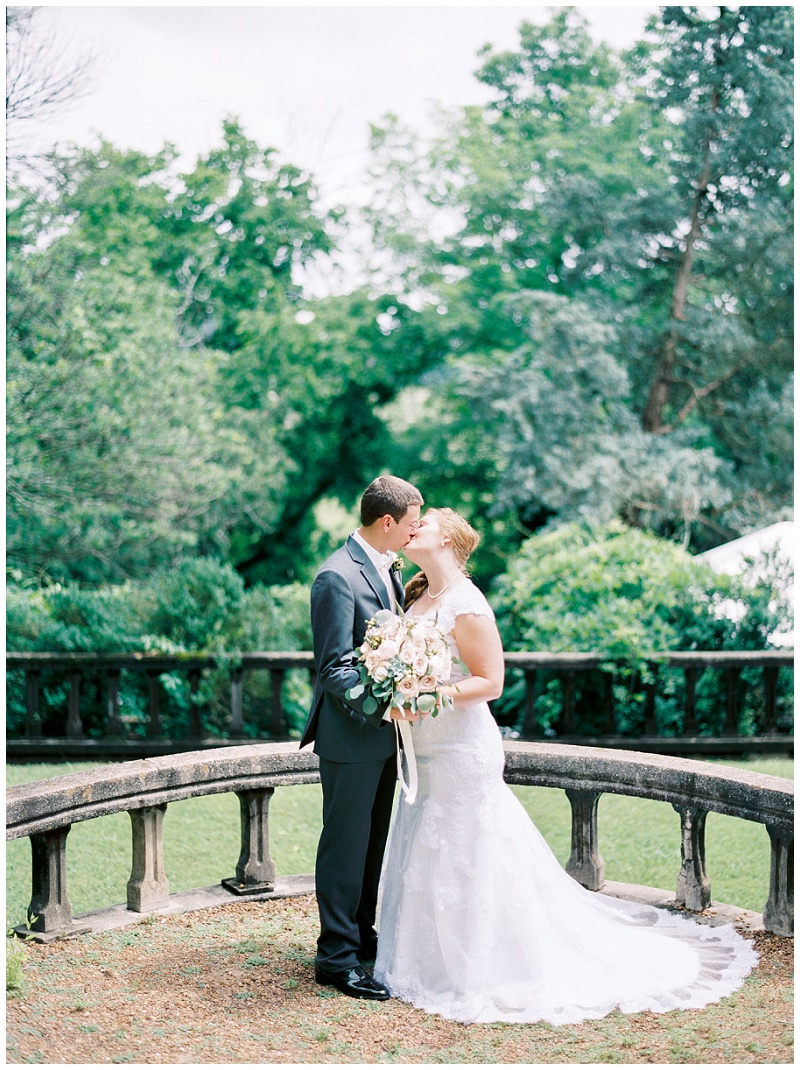 Bride and groom kissing at Knoxville wedding