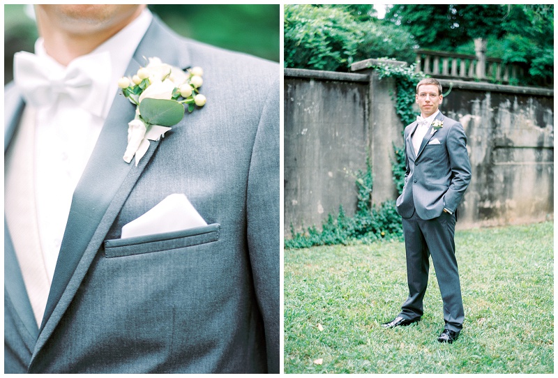 Groom candid portrait historic venue