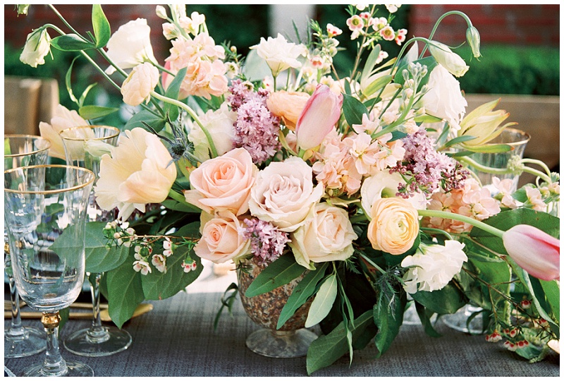 table reception floral arrangements at Houston TX garden wedding venue