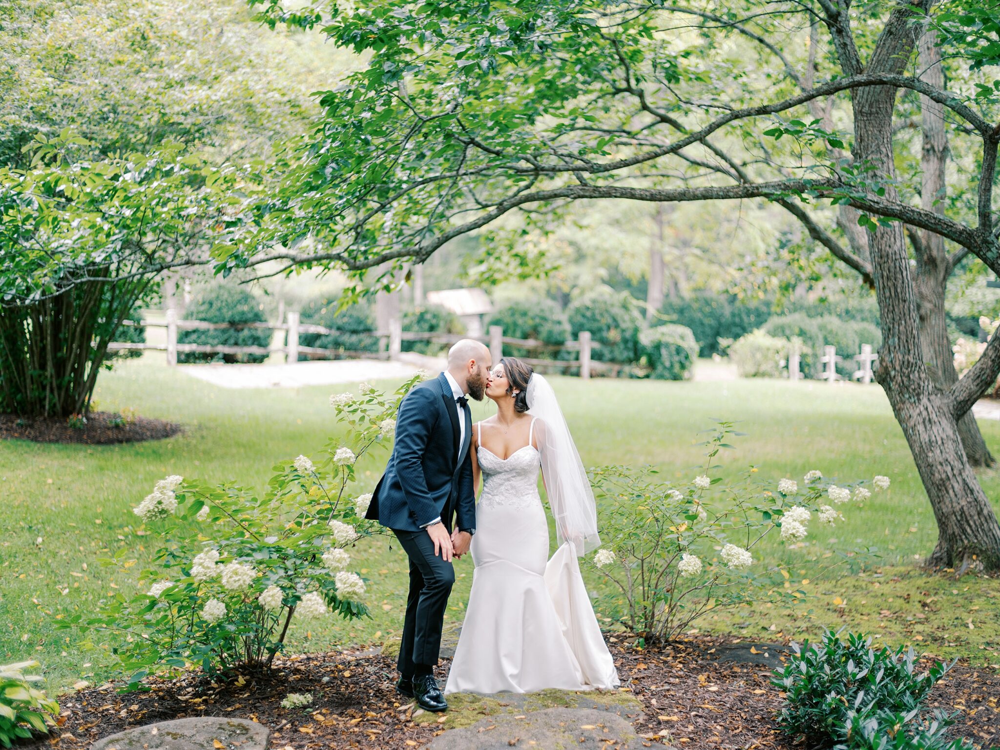 Bride and groom walking North Carolina vineyard venue