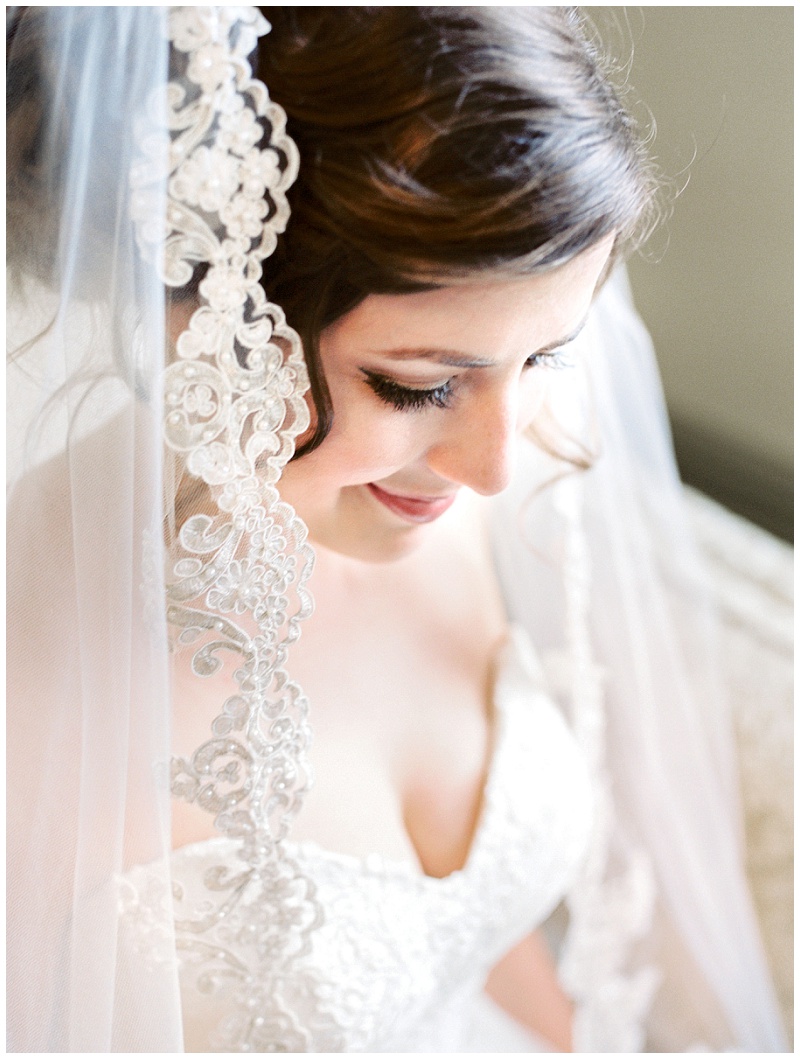 Emotional bridal getting ready moment with bridesmaids at East Tennessee wedding venue in natural light room