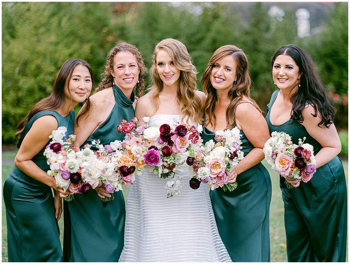 Bridesmaids posing at The Olde Farm wedding