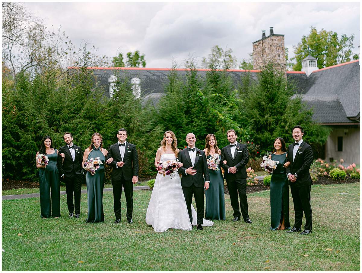 Bridal party celebrating outdoors at The Olde Farm wedding