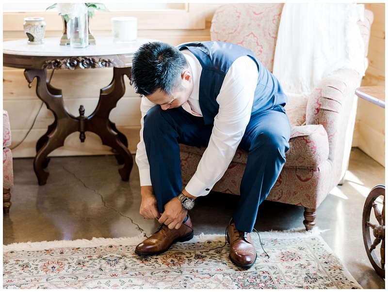 Groom smiling during portraits at The Homeplace at Johnston Farm wedding