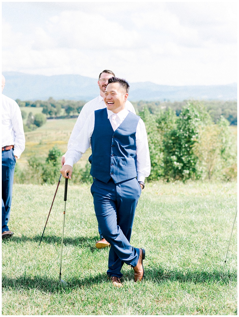 Groom posing confidently at The Homeplace at Johnston Farm wedding