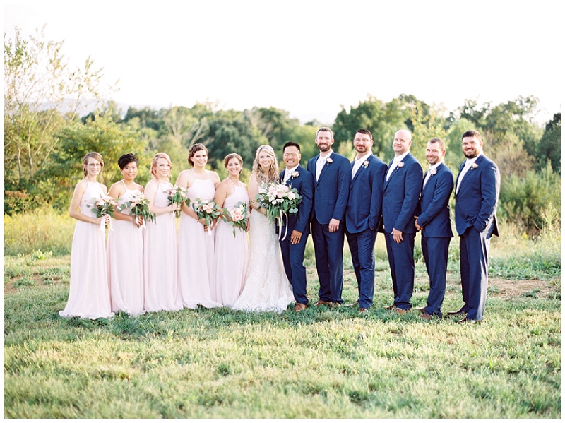 Bridal party celebrating with couple at The Homeplace at Johnston Farm wedding