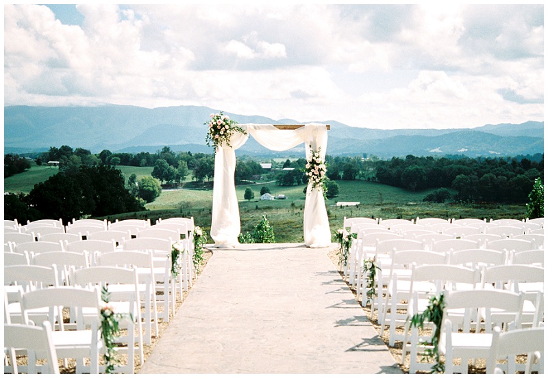 outdoor ceremony setup at The Homeplace at Johnston Farm wedding with mountain views