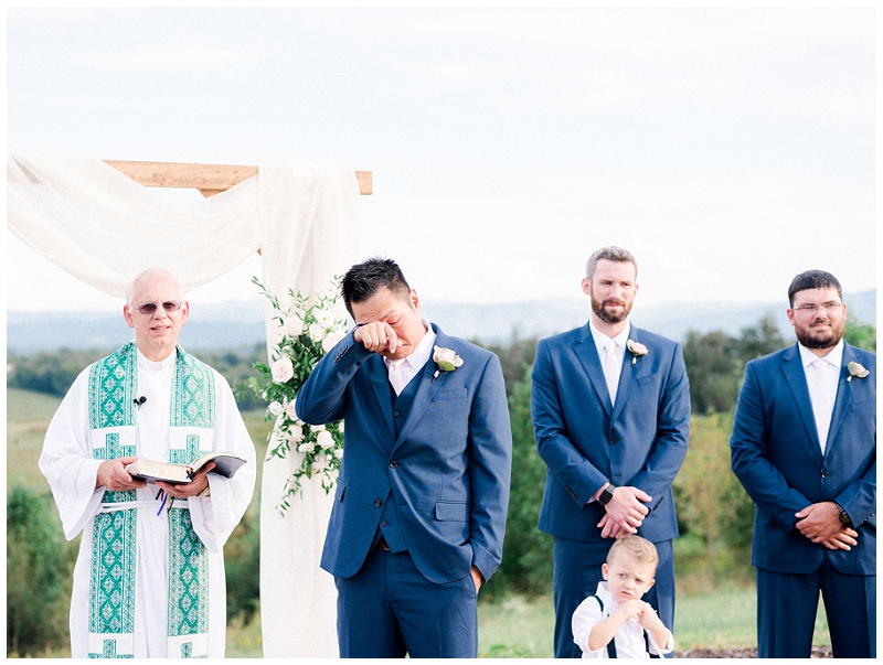emotional groom at The Homeplace at Johnston Farm wedding ceremony