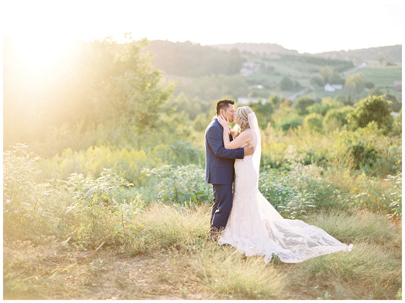 Bride and groom in field at The Homeplace at Johnston Farm wedding