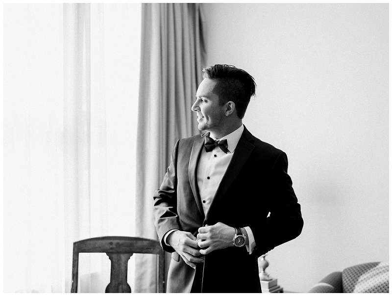 Groom getting ready for The Inn at Wise wedding adjusting tie